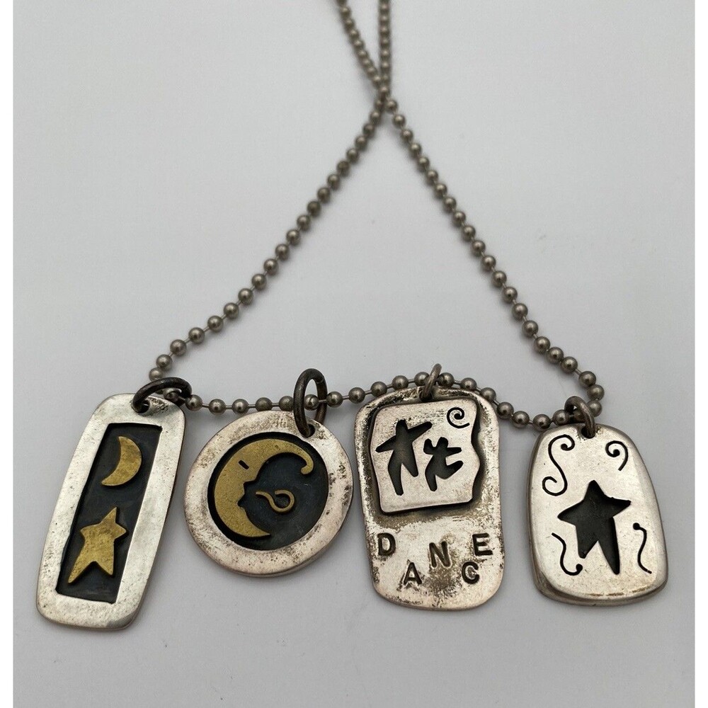 Four designer pendants by Far Fetched